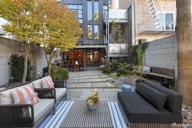 view of patio featuring outdoor lounge area and french doors