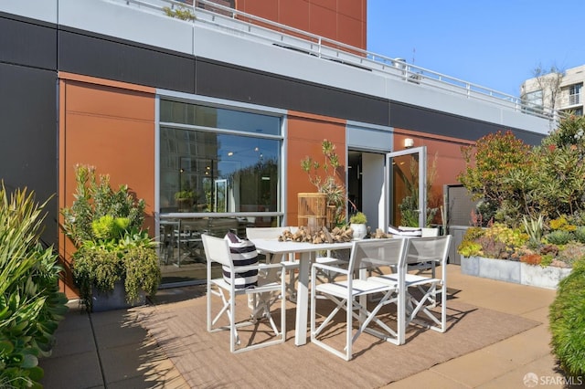 view of patio with outdoor dining area