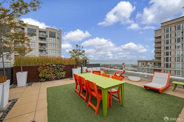 view of patio / terrace featuring a water view