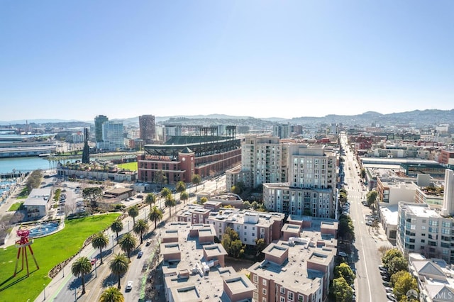 property's view of city featuring a water view