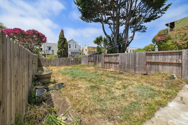 view of yard featuring a fenced backyard