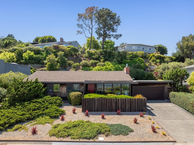 308 E Strawberry Dr, Mill Valley, CA 94941 - ranch-style house with an attached garage, driveway, and a chimney