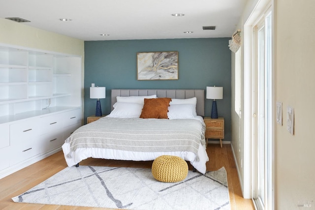 bedroom with light hardwood / wood-style flooring