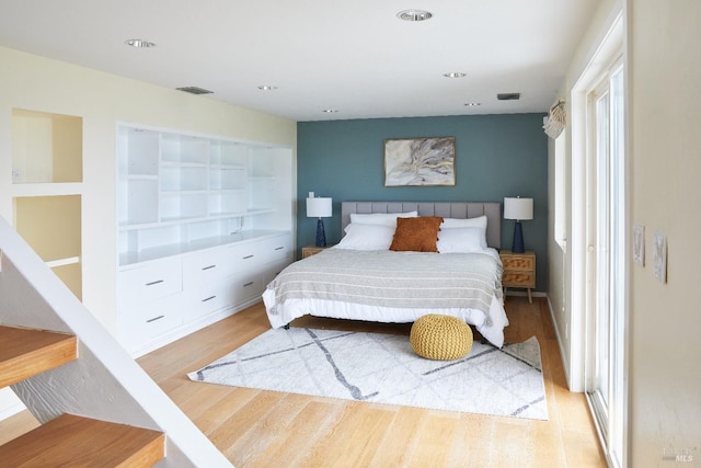 bedroom featuring light hardwood / wood-style flooring