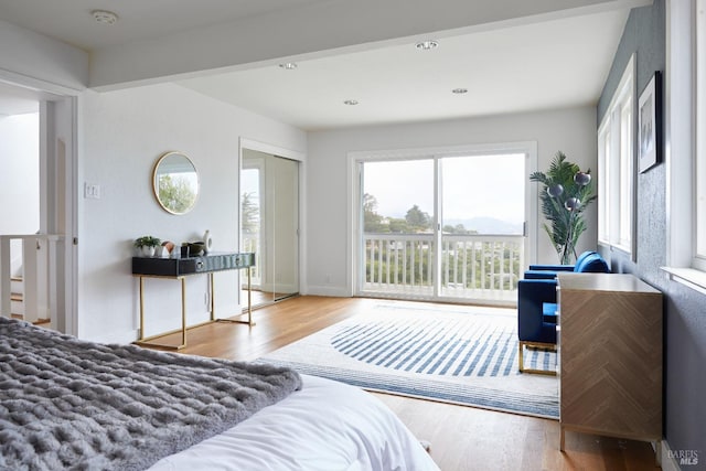 bedroom featuring a closet and light wood-type flooring