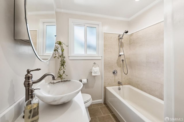 full bath with toilet, ornamental molding, a sink, tile patterned flooring, and bathing tub / shower combination