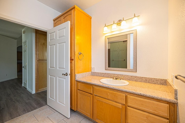 bathroom with vanity and tile patterned flooring