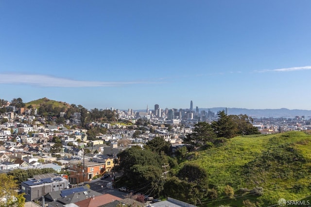 exterior space with a mountain view and a city view