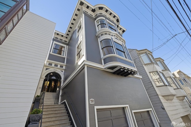 view of building exterior featuring a garage