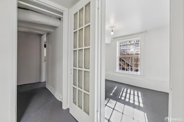 interior space with concrete flooring