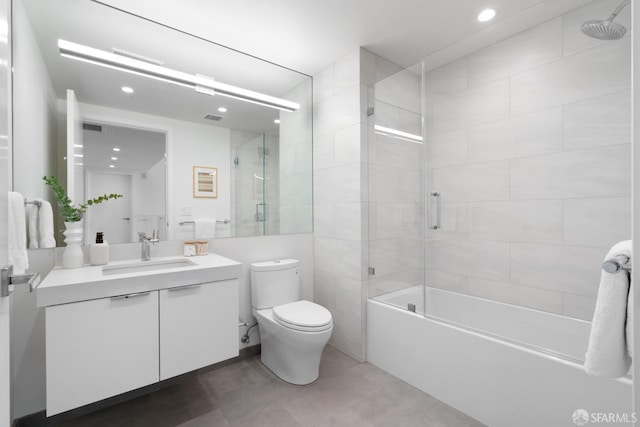 full bathroom with vanity, visible vents, shower / bath combination with glass door, recessed lighting, and toilet