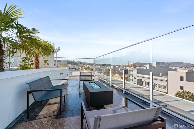 view of patio with a fire pit