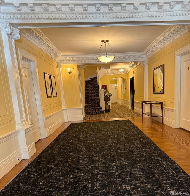 2299 Sacramento St Unit 15, San Francisco, CA 94115 - community lobby featuring crown molding, a decorative wall, and stairs