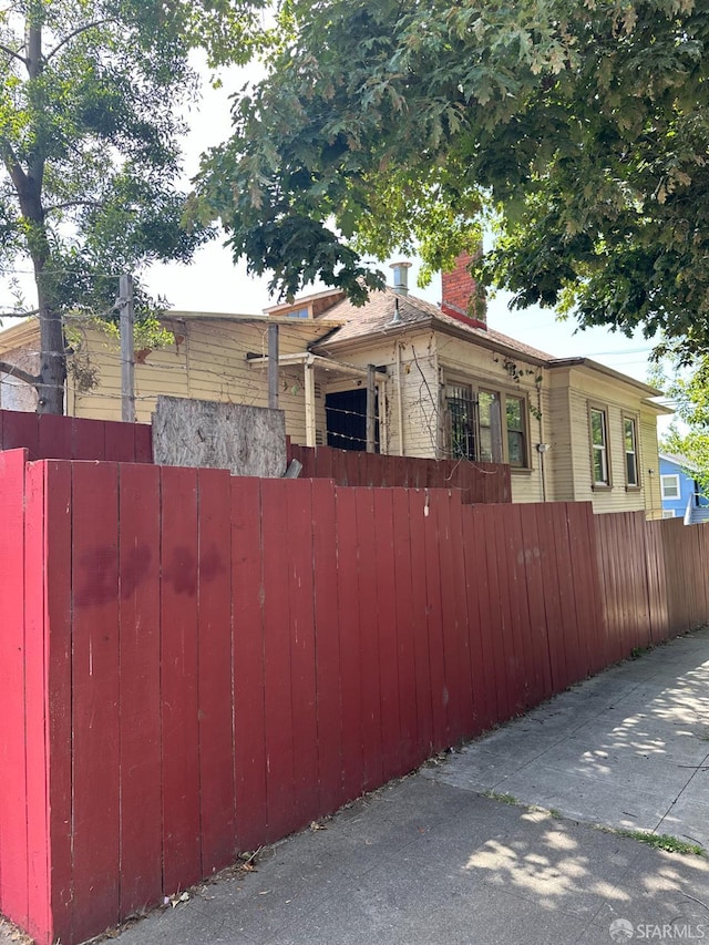 2140 27th Ave, Oakland, CA 94601 - view of home's exterior with a chimney