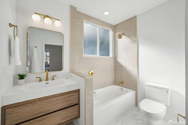 full bathroom with tiled shower / bath combo, vanity, and toilet