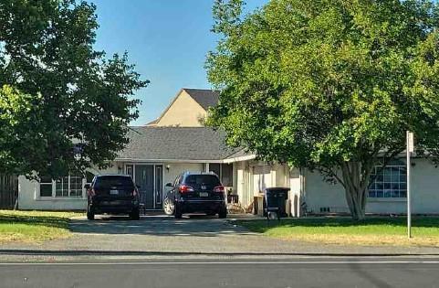 1301 Bell Ave, Sacramento, CA 95838 - view of front of home with driveway and stucco siding