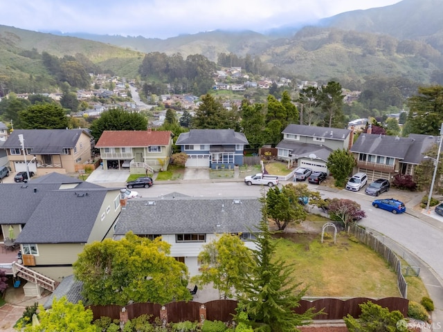 bird's eye view with a residential view and a mountain view