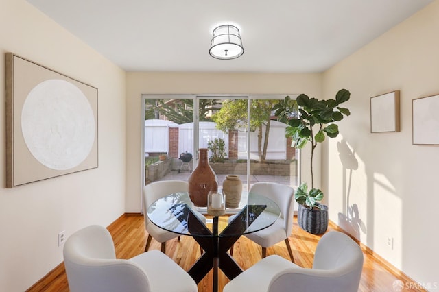 dining area featuring wood finished floors