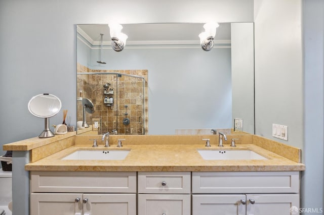 bathroom featuring ornamental molding, toilet, a shower with shower door, and vanity