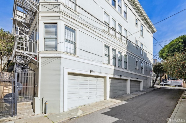 view of property exterior featuring a garage