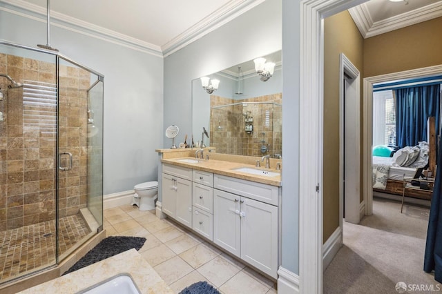 bathroom featuring vanity, tile patterned flooring, crown molding, and walk in shower