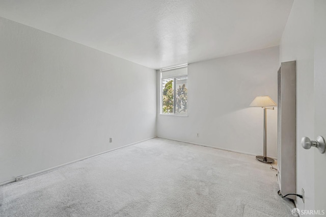 1455 Laguna St Unit 6, San Francisco, CA 94115 - empty room with a heating unit and carpet