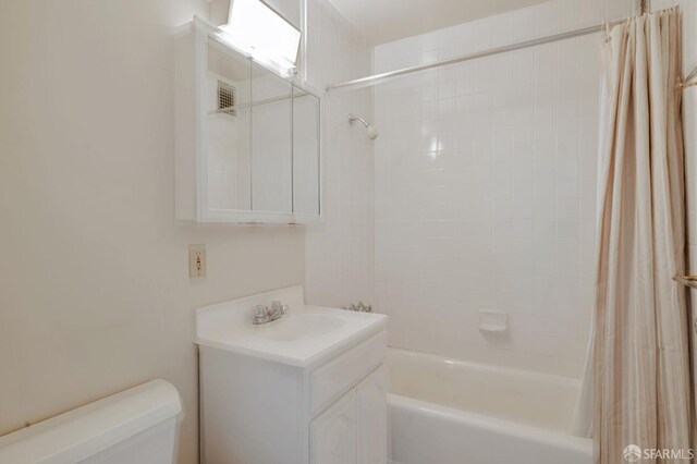 1455 Laguna St Unit 6, San Francisco, CA 94115 - bathroom with toilet, vanity, and shower / tub combo with curtain