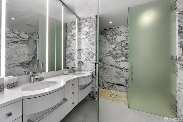 181 Fremont St Unit 55C, San Francisco, CA 94105 - full bathroom featuring double vanity, a marble finish shower, and recessed lighting