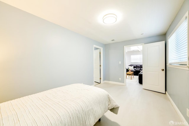 19652 Stanton Ave, Castro Valley, CA 94546 - bedroom featuring light carpet and multiple windows