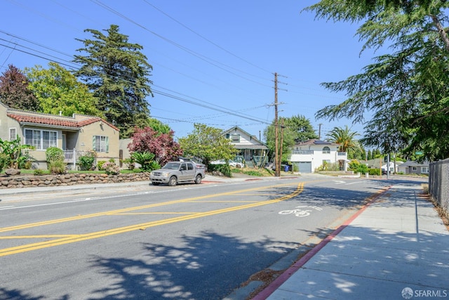 19652 Stanton Ave, Castro Valley, CA 94546 - view of asphalt street with sidewalks, curbs, and a residential view