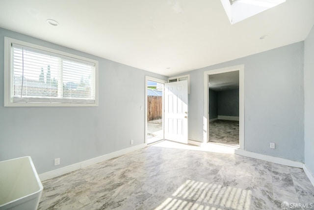19652 Stanton Ave, Castro Valley, CA 94546 - unfurnished room featuring plenty of natural light and a skylight