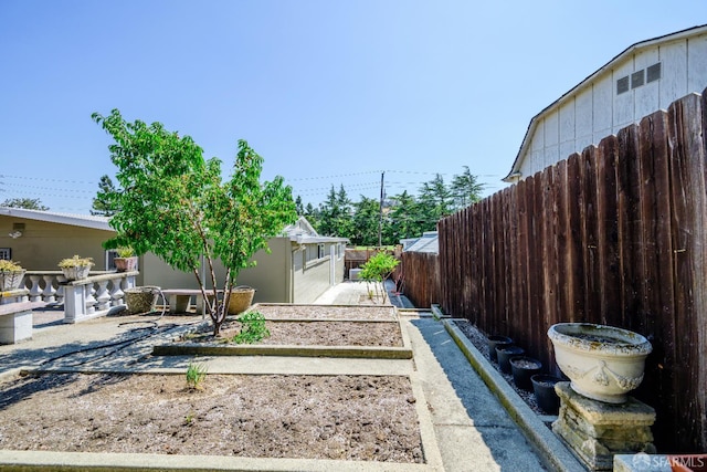 19652 Stanton Ave, Castro Valley, CA 94546 - fenced backyard with a vegetable garden