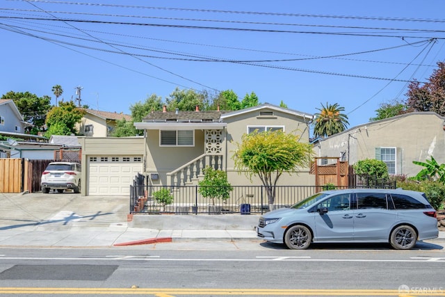 19652 Stanton Ave, Castro Valley, CA 94546 - view of front facade featuring a garage, stucco siding, and driveway