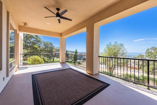 view of patio / terrace featuring ceiling fan and a balcony