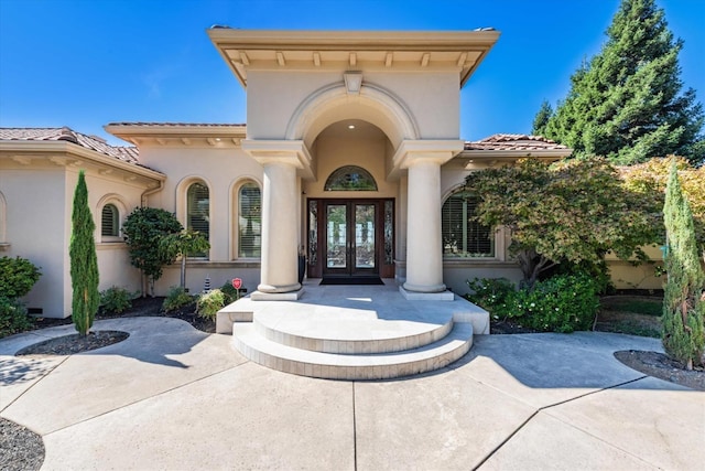 view of exterior entry with french doors