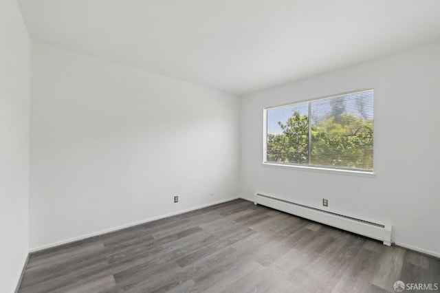 134 Albatross Ct, San Francisco, CA 94124 - empty room with baseboard heating, wood finished floors, and baseboards