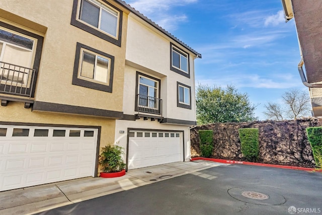 exterior space featuring stucco siding