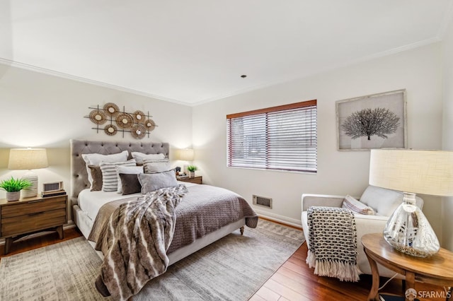 2171 Sacramento St Unit 4, San Francisco, CA 94109 - bedroom featuring crown molding, baseboards, wood finished floors, and visible vents