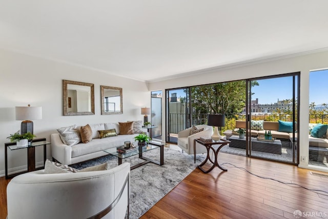 2171 Sacramento St Unit 4, San Francisco, CA 94109 - living room featuring visible vents, ornamental molding, and hardwood / wood-style flooring