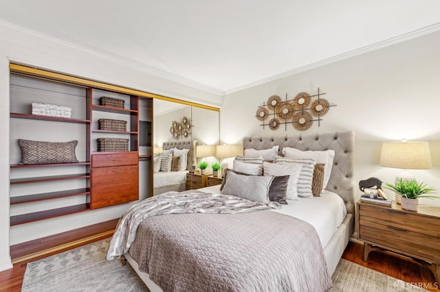 2171 Sacramento St Unit 4, San Francisco, CA 94109 - bedroom with ornamental molding, a closet, and wood finished floors