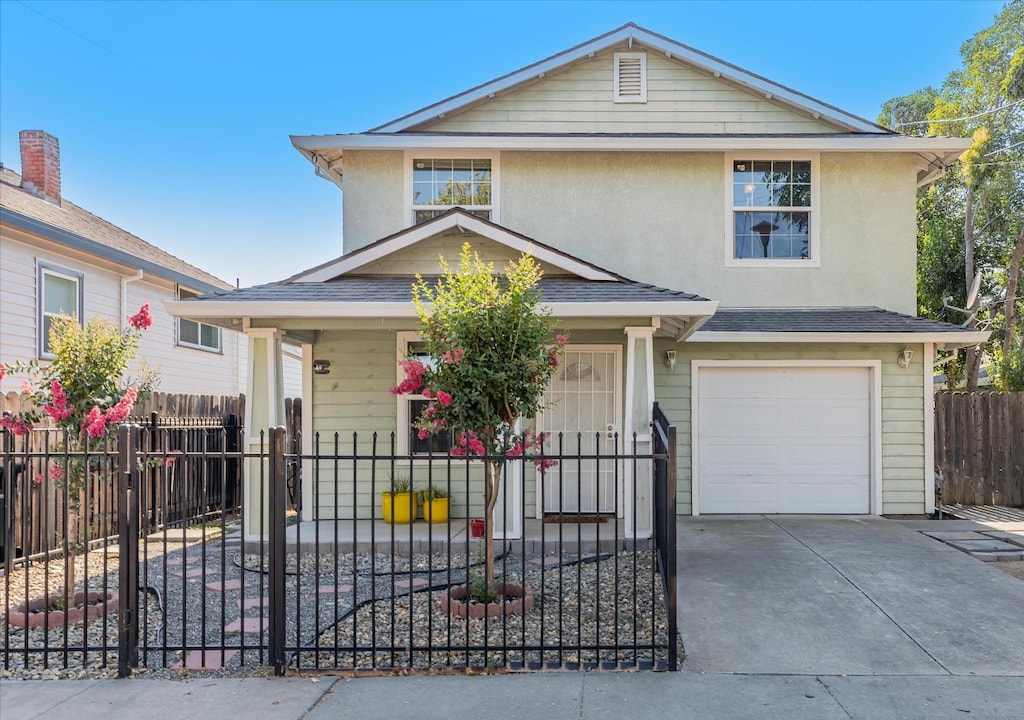 view of front of property featuring a garage