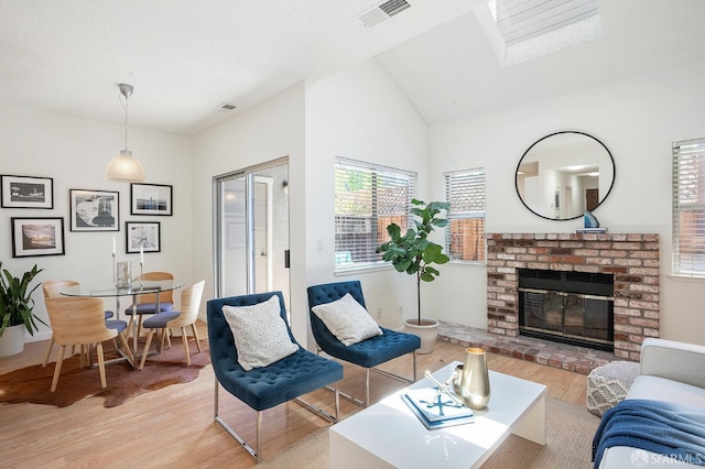 3937 Vine St, Pleasanton, CA 94566 - living area with light wood-style flooring, lofted ceiling, and a fireplace