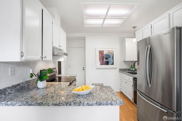3937 Vine St, Pleasanton, CA 94566 - kitchen featuring appliances with stainless steel finishes, under cabinet range hood, a sink, and white cabinets