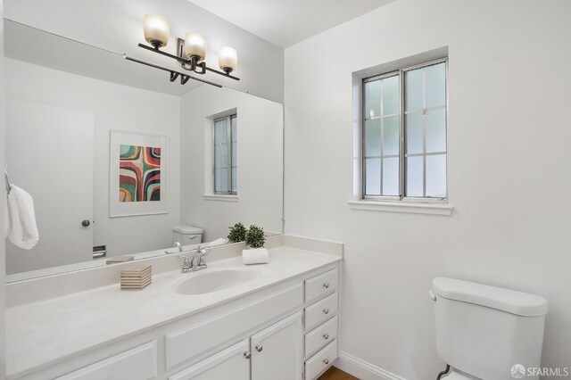 3937 Vine St, Pleasanton, CA 94566 - bathroom with toilet, a chandelier, and vanity