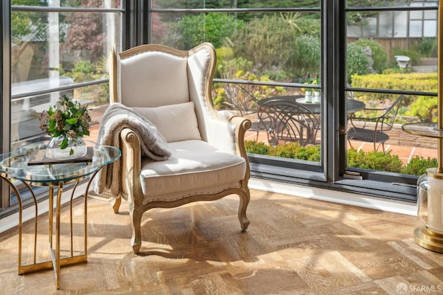 sunroom / solarium featuring a healthy amount of sunlight