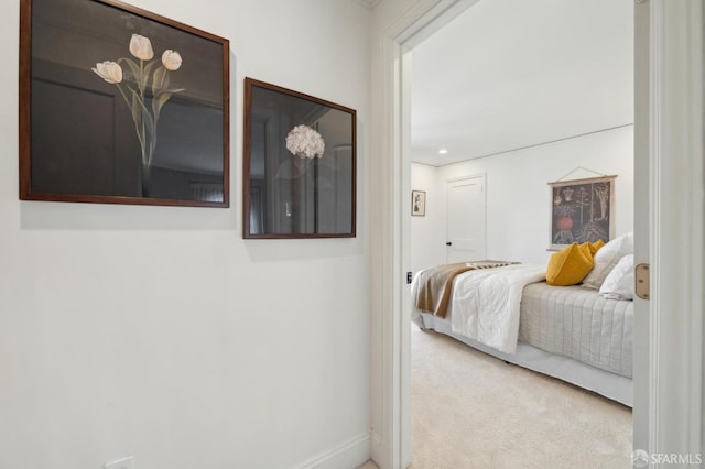 carpeted bedroom with baseboards