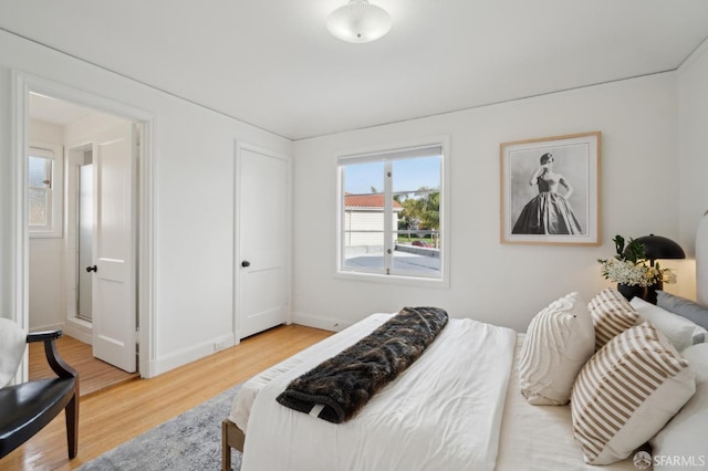 bedroom featuring light wood finished floors