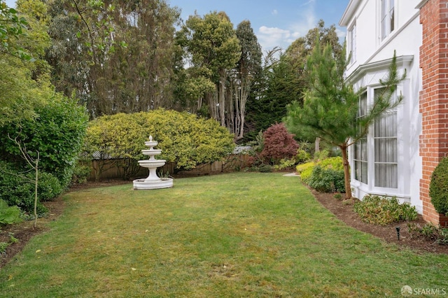 view of yard with fence