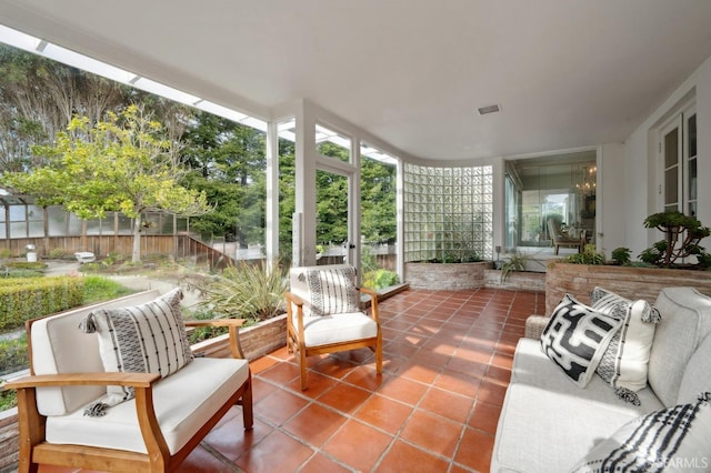 sunroom featuring visible vents