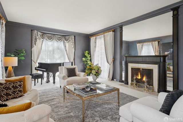 living area featuring a fireplace and crown molding